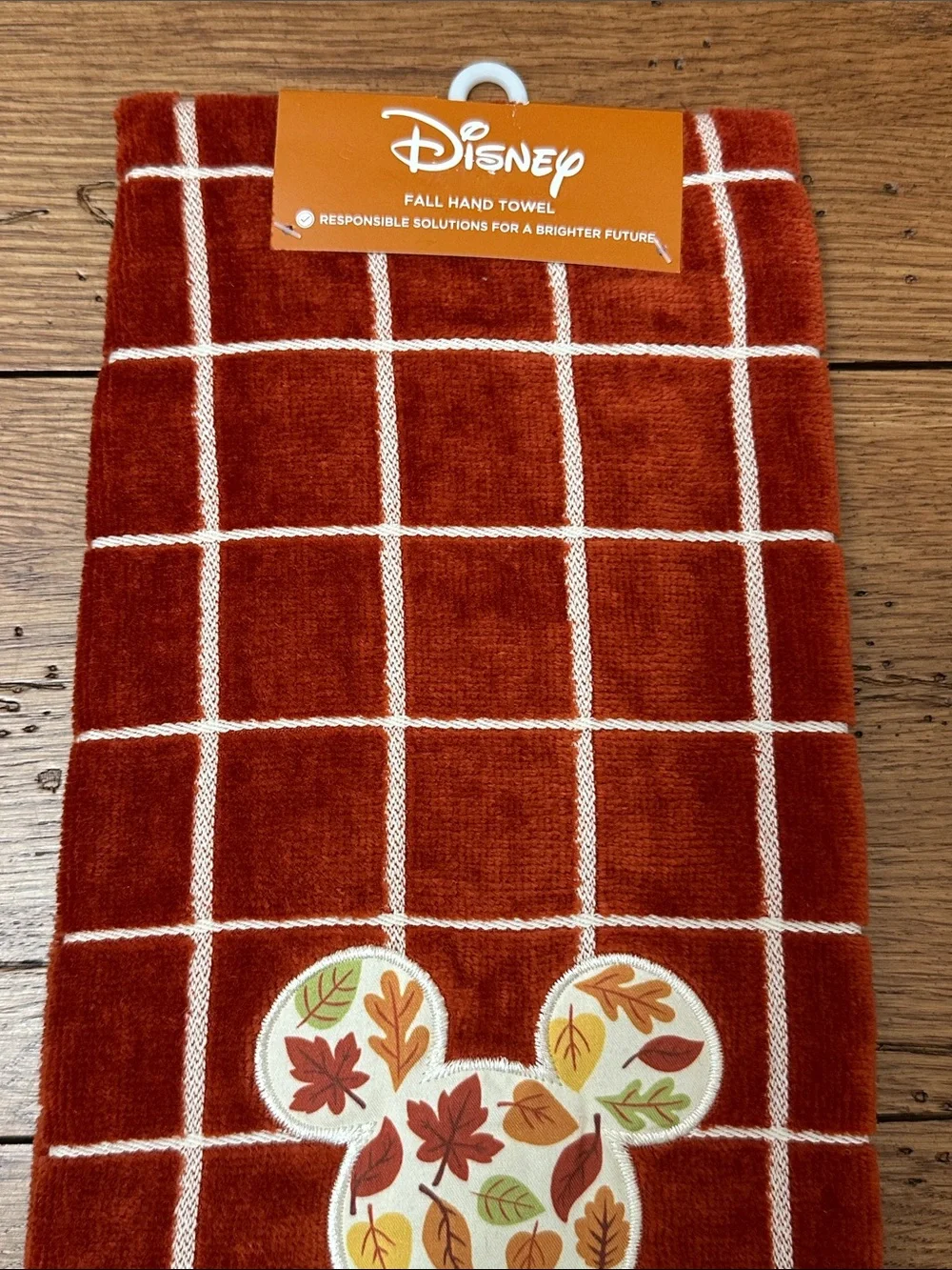 Disney Rust Orange Grid Hand Towel with Leaf Mickey Patch